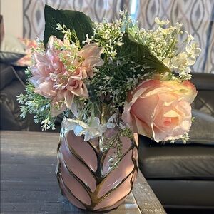 Elegant Pink and Gold Vase with Floral Arrangement